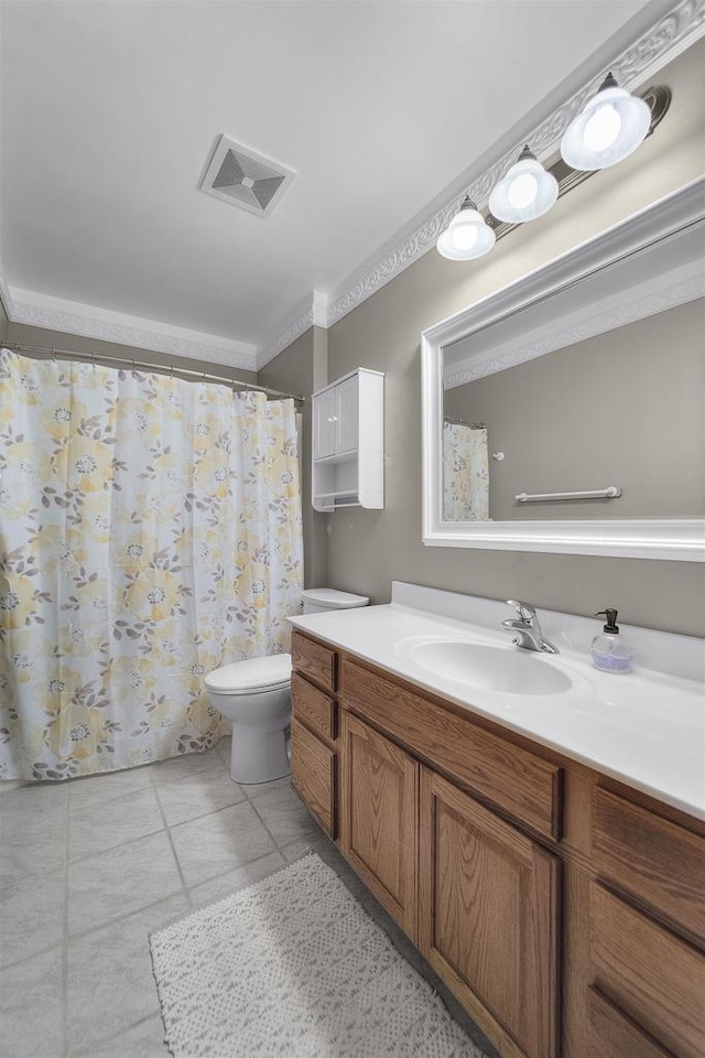 7217 Iris Bloom Dr, Madison, WI 53719 - bathroom featuring toilet, vanity, a shower with curtain, and tile patterned floors