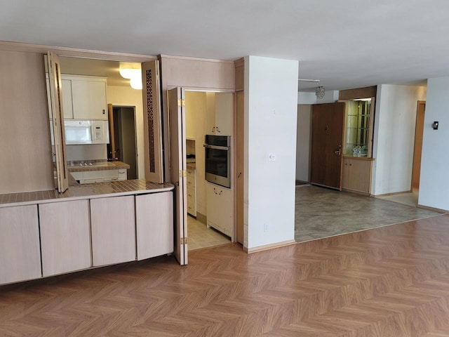 1610 N Prospect Ave Unit 504, Milwaukee, WI 53202 - kitchen featuring oven and white microwave