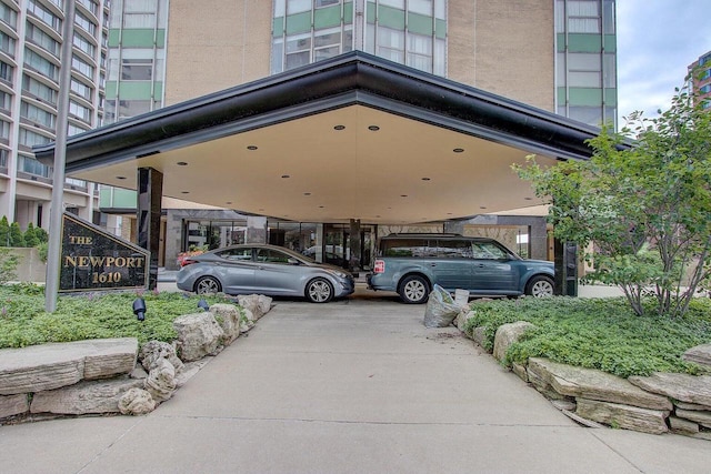 1610 N Prospect Ave Unit 506, Milwaukee, WI 53202 - view of parking / parking lot with a carport