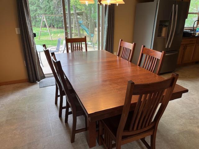 1030 Woodland Ct, Plover, WI 54467 - dining room with baseboards