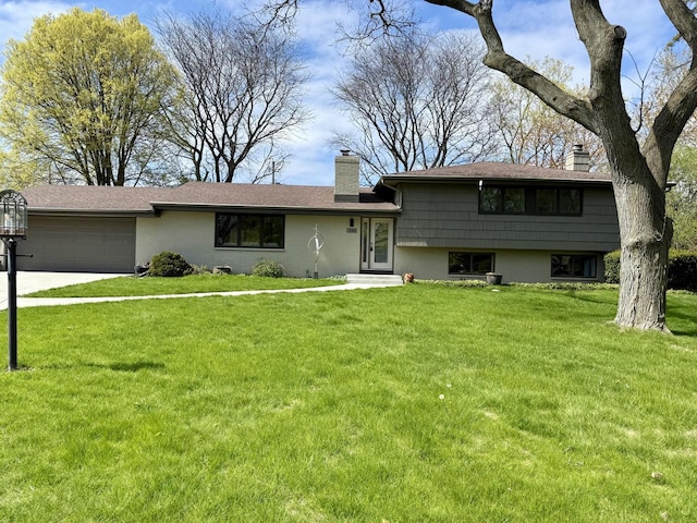 250 W Suburban Ct, Fox Point, WI 53217 - split level home featuring a chimney, a garage, a front yard, and concrete driveway