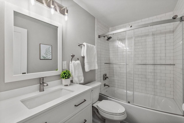 250 W Suburban Ct, Fox Point, WI 53217 - bathroom with toilet, vanity, and combined bath / shower with glass door