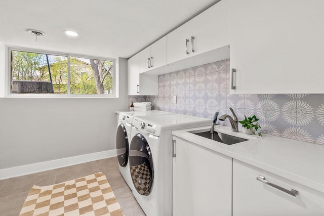 250 W Suburban Ct, Fox Point, WI 53217 - washroom with cabinet space, washing machine and dryer, light tile patterned flooring, and baseboards