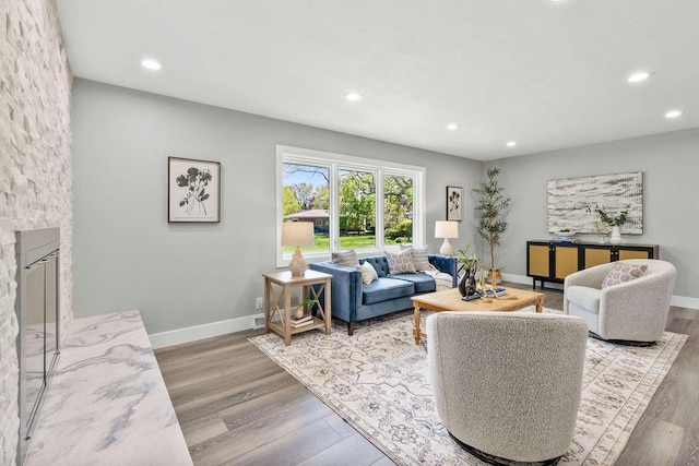 250 W Suburban Ct, Fox Point, WI 53217 - living room featuring recessed lighting, wood finished floors, and baseboards