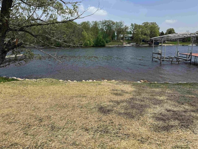 E12742 Weigands Bay N, Merrimac, WI 53561 - dock area with boat lift and a water view