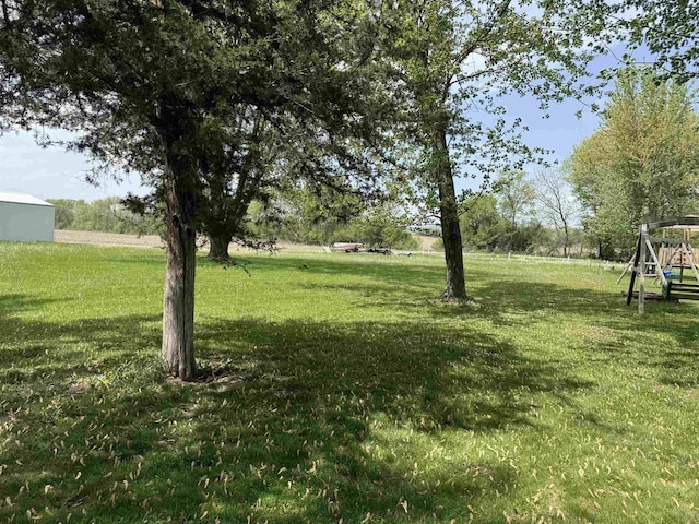 E12742 Weigands Bay N, Merrimac, WI 53561 - view of green lawn featuring a playground