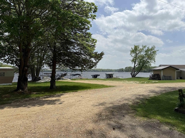 E12742 Weigands Bay N, Merrimac, WI 53561 - view of yard featuring a water view and dirt driveway