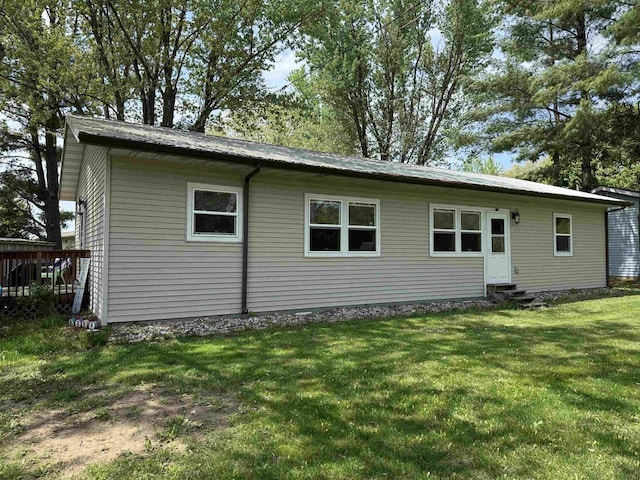E12742 Weigands Bay N, Merrimac, WI 53561 - back of property with entry steps and a lawn