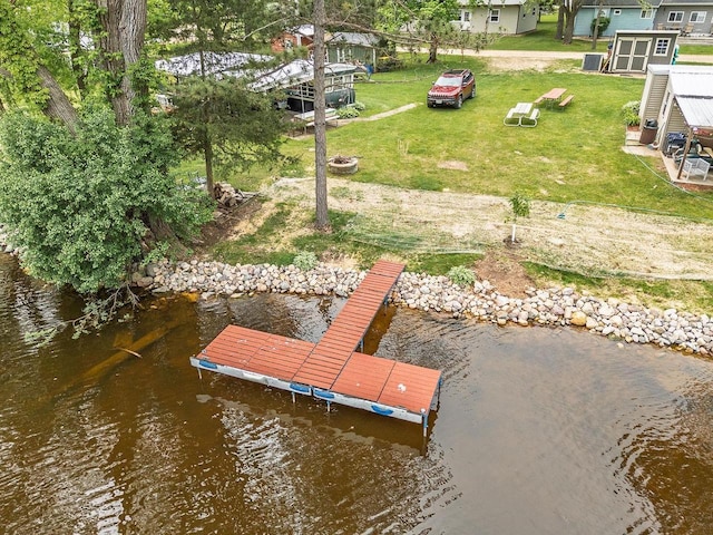 E12742 Weigands Bay N, Merrimac, WI 53561 - dock featuring a water view and a lawn