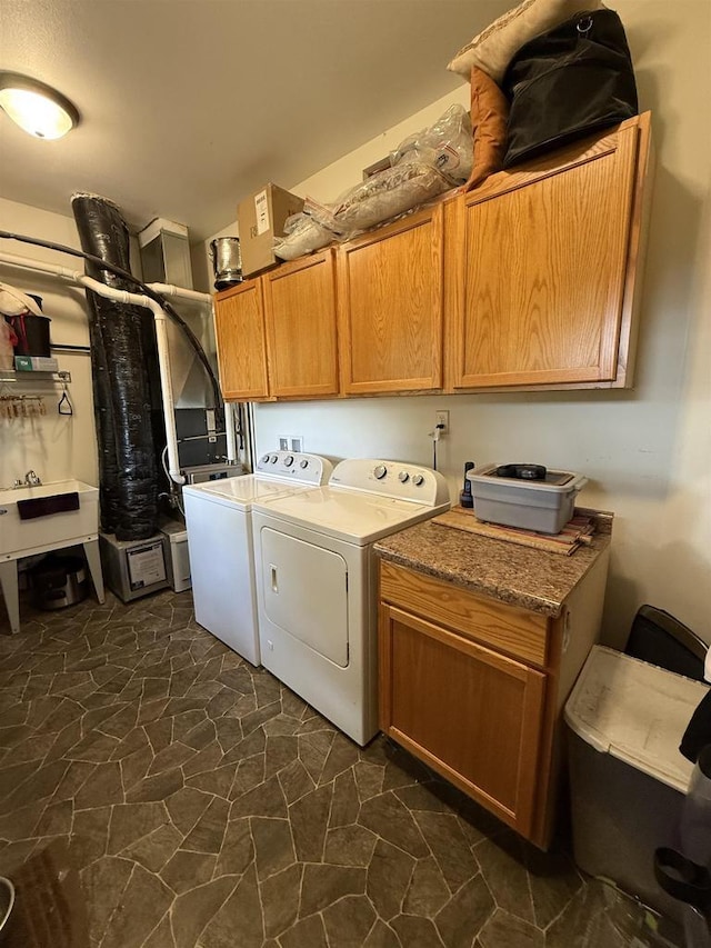 E12742 Weigands Bay N, Merrimac, WI 53561 - laundry area featuring cabinet space and washer and clothes dryer