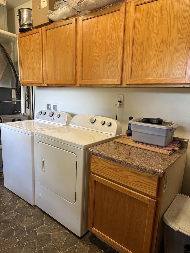 E12742 Weigands Bay N, Merrimac, WI 53561 - laundry area featuring separate washer and dryer and cabinet space