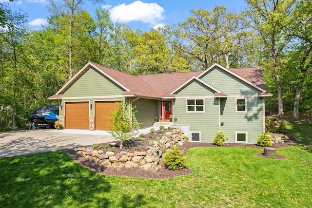 S7698 Grandview Ave, Merrimac, WI 53561 - single story home featuring driveway, a garage, a front yard, and roof with shingles