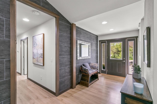 S7698 Grandview Ave, Merrimac, WI 53561 - entryway with light wood-type flooring, tile walls, recessed lighting, and baseboards
