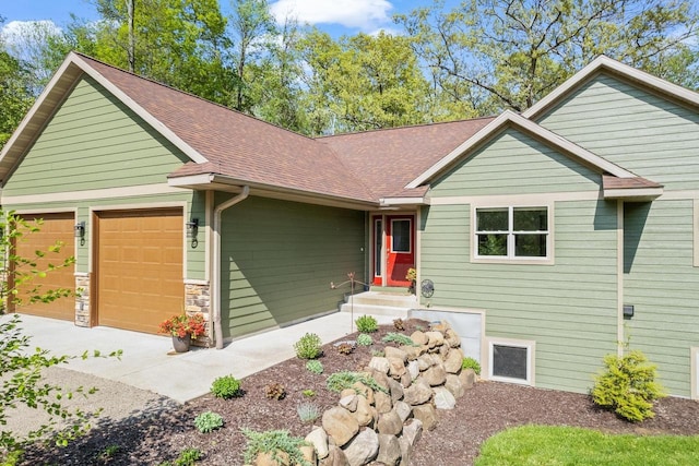 S7698 Grandview Ave, Merrimac, WI 53561 - ranch-style house featuring an attached garage and a shingled roof