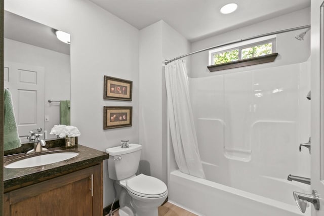 S7698 Grandview Ave, Merrimac, WI 53561 - bathroom featuring toilet, vanity, and shower / bath combo