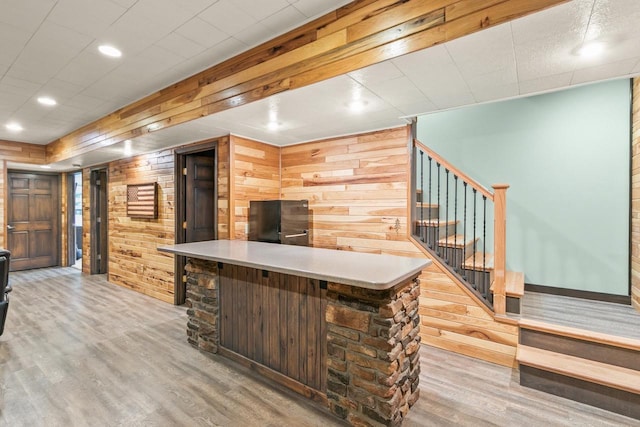 S7698 Grandview Ave, Merrimac, WI 53561 - bar featuring wood walls, wood finished floors, stairway, and recessed lighting