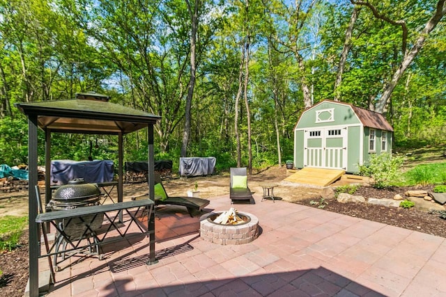 S7698 Grandview Ave, Merrimac, WI 53561 - view of patio with an outdoor fire pit, a gazebo, and an outbuilding