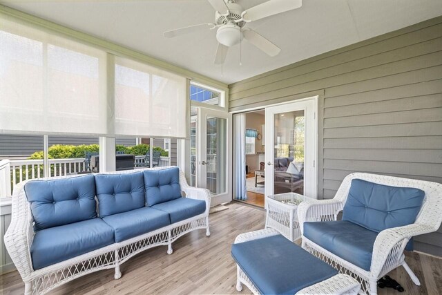 1885 Golfview Dr Unit 35-17, Lake Geneva, WI 53147 - sunroom with french doors, ceiling fan, and outdoor lounge area