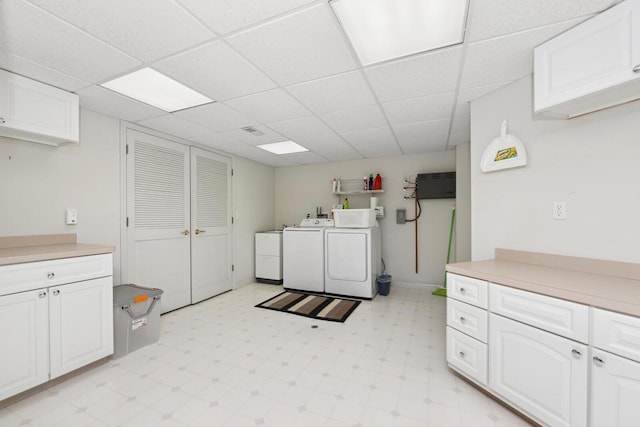 1885 Golfview Dr Unit 35-17, Lake Geneva, WI 53147 - laundry area with cabinet space, washing machine and clothes dryer, and light flooring