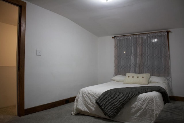 232 Harrison Ave, Waukesha, WI 53186 - bedroom with carpet, baseboards, and vaulted ceiling