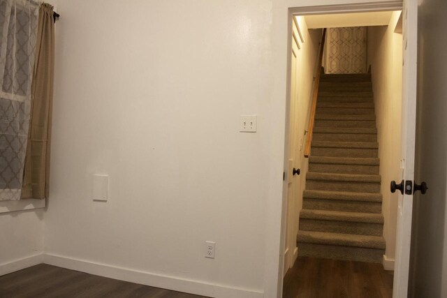 232 Harrison Ave, Waukesha, WI 53186 - staircase featuring wood finished floors and baseboards