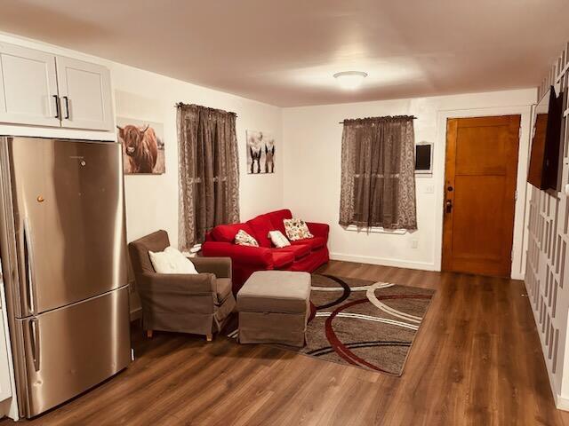 232 Harrison Ave, Waukesha, WI 53186 - living room featuring wood finished floors and baseboards