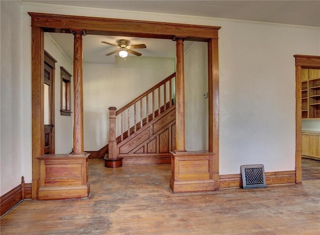 4190 County Road P, Spring Valley, WI 54767 - foyer entrance with wood finished floors, stairway, ceiling fan, ornamental molding, and baseboards