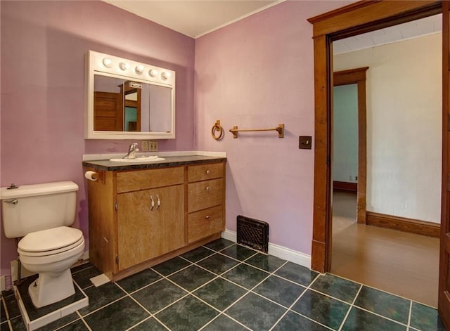 4190 County Road P, Spring Valley, WI 54767 - half bathroom with toilet, vanity, tile patterned flooring, and baseboards