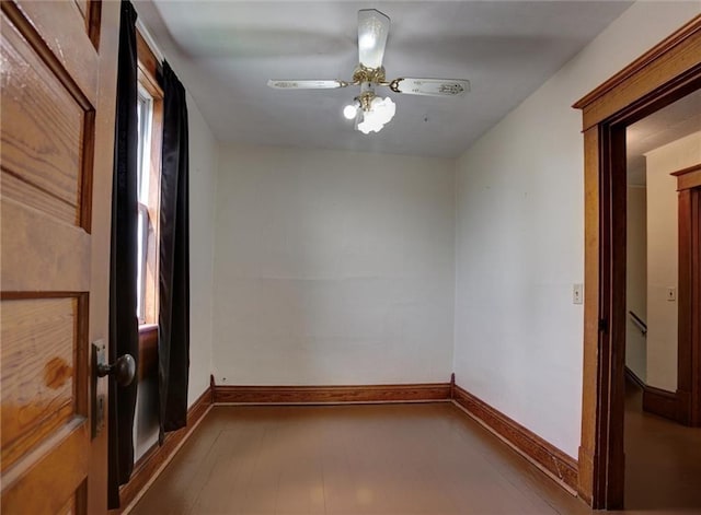 4190 County Road P, Spring Valley, WI 54767 - spare room featuring baseboards, ceiling fan, and plenty of natural light