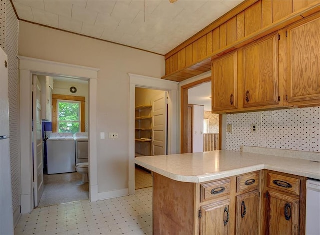 4190 County Road P, Spring Valley, WI 54767 - kitchen featuring light floors, brown cabinets, light countertops, and baseboards