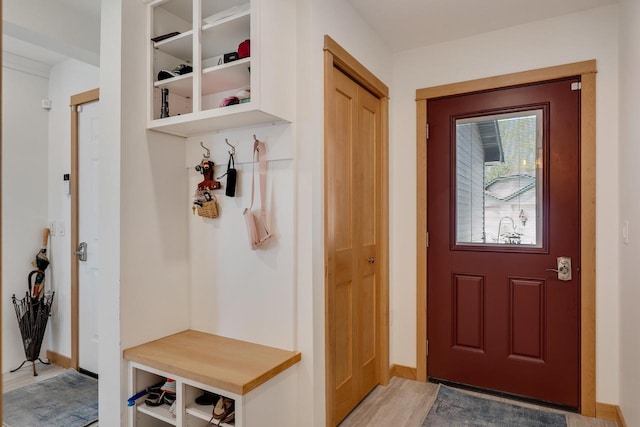 1204 Lakeview Dr # 6, Tomah, WI 54660 - mudroom with baseboards and light wood-style floors