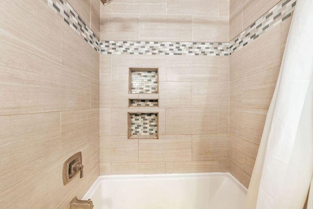 full bath featuring shower / tub combination