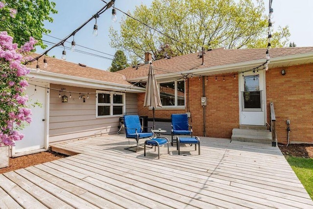 wooden deck featuring entry steps