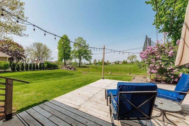 deck featuring a lawn