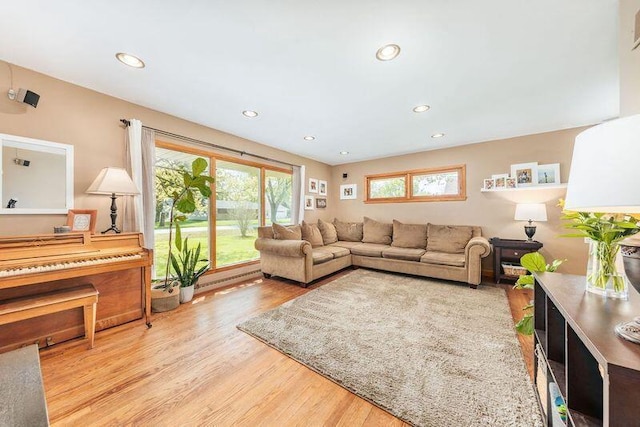 living room featuring wood finished floors and recessed lighting