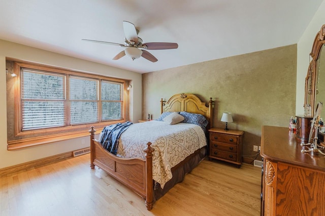 N4404 Pine Dr, Montello, WI 53949 - bedroom with light wood-style floors, baseboards, and ceiling fan
