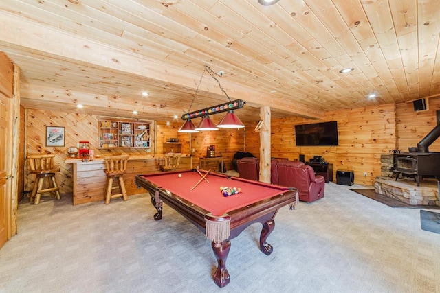 N4404 Pine Dr, Montello, WI 53949 - game room with wood walls, a wood stove, wooden ceiling, light carpet, and billiards