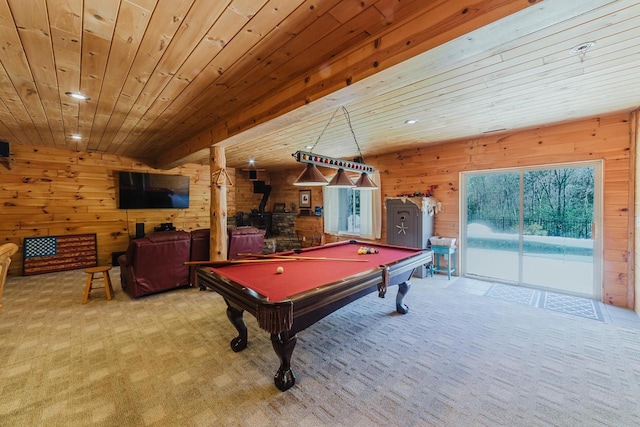 N4404 Pine Dr, Montello, WI 53949 - game room featuring a wood stove, wood walls, billiards table, recessed lighting, and carpet flooring