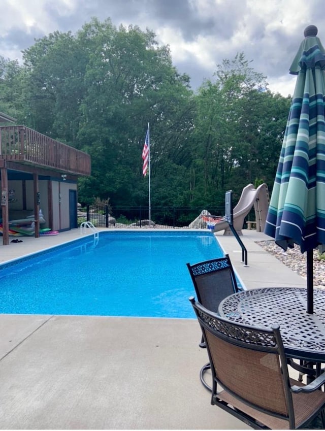 N4404 Pine Dr, Montello, WI 53949 - view of swimming pool featuring a patio and fence