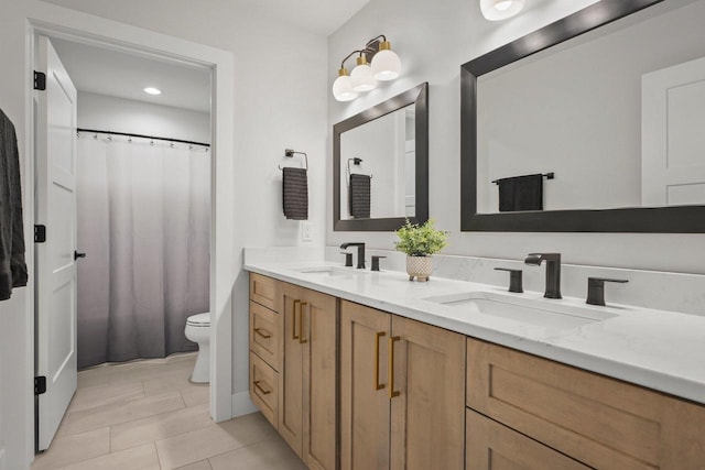 815 Steven Vw, Waunakee, WI 53597 - full bath featuring toilet, double vanity, tile patterned flooring, and recessed lighting