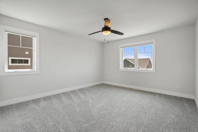 815 Steven Vw, Waunakee, WI 53597 - unfurnished room with baseboards, carpet, and a ceiling fan