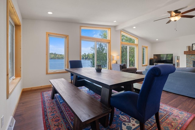 12450 Nixon Rd, Minocqua, WI 54548 - dining area featuring wood finished floors, baseboards, a ceiling fan, a fireplace, and recessed lighting