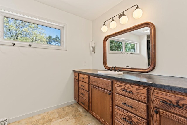 450 Lake Ave, Montello, WI 53949 - bathroom with baseboards and vanity