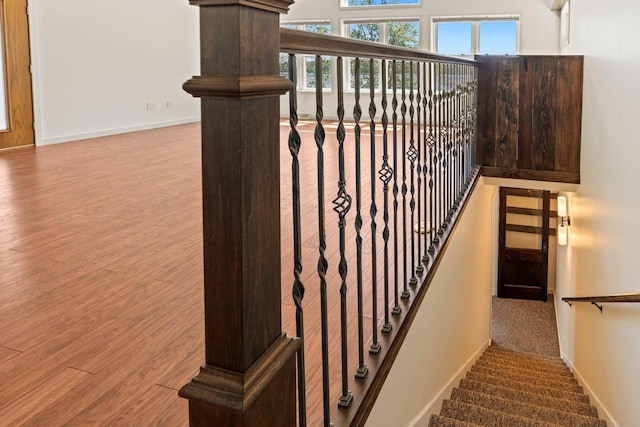 450 Lake Ave, Montello, WI 53949 - stairs featuring wood finished floors and baseboards