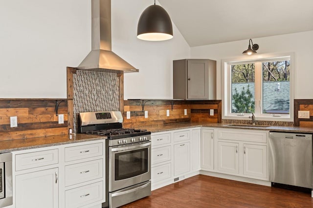 450 Lake Ave, Montello, WI 53949 - kitchen with appliances with stainless steel finishes, island exhaust hood, a sink, dark stone countertops, and lofted ceiling