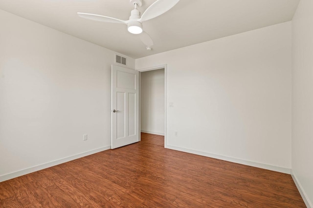 450 Lake Ave, Montello, WI 53949 - empty room with baseboards, wood finished floors, and a ceiling fan