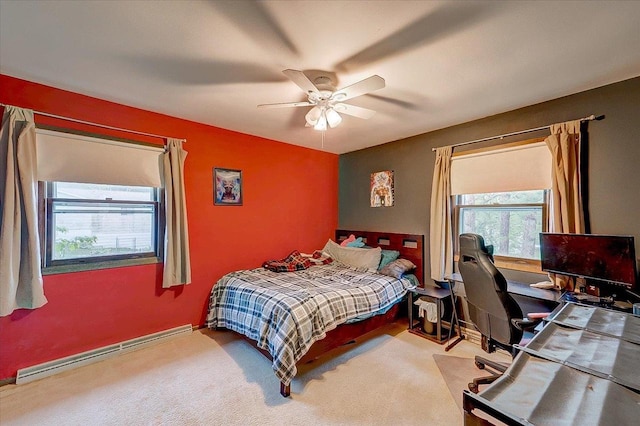 864 Suellen Ln, Portage, WI 53901 - bedroom with multiple windows, a baseboard radiator, an office area, and carpet flooring