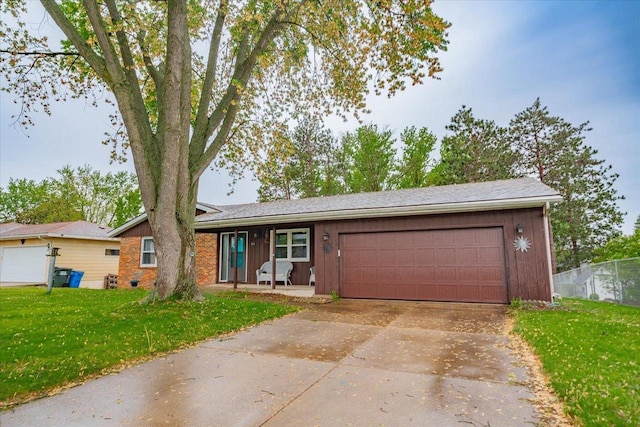 864 Suellen Ln, Portage, WI 53901 - view of front of property featuring driveway and a garage