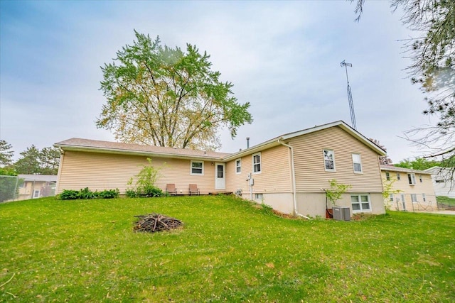 864 Suellen Ln, Portage, WI 53901 - back of property with central AC unit