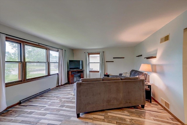 864 Suellen Ln, Portage, WI 53901 - living area featuring light wood finished floors and baseboards